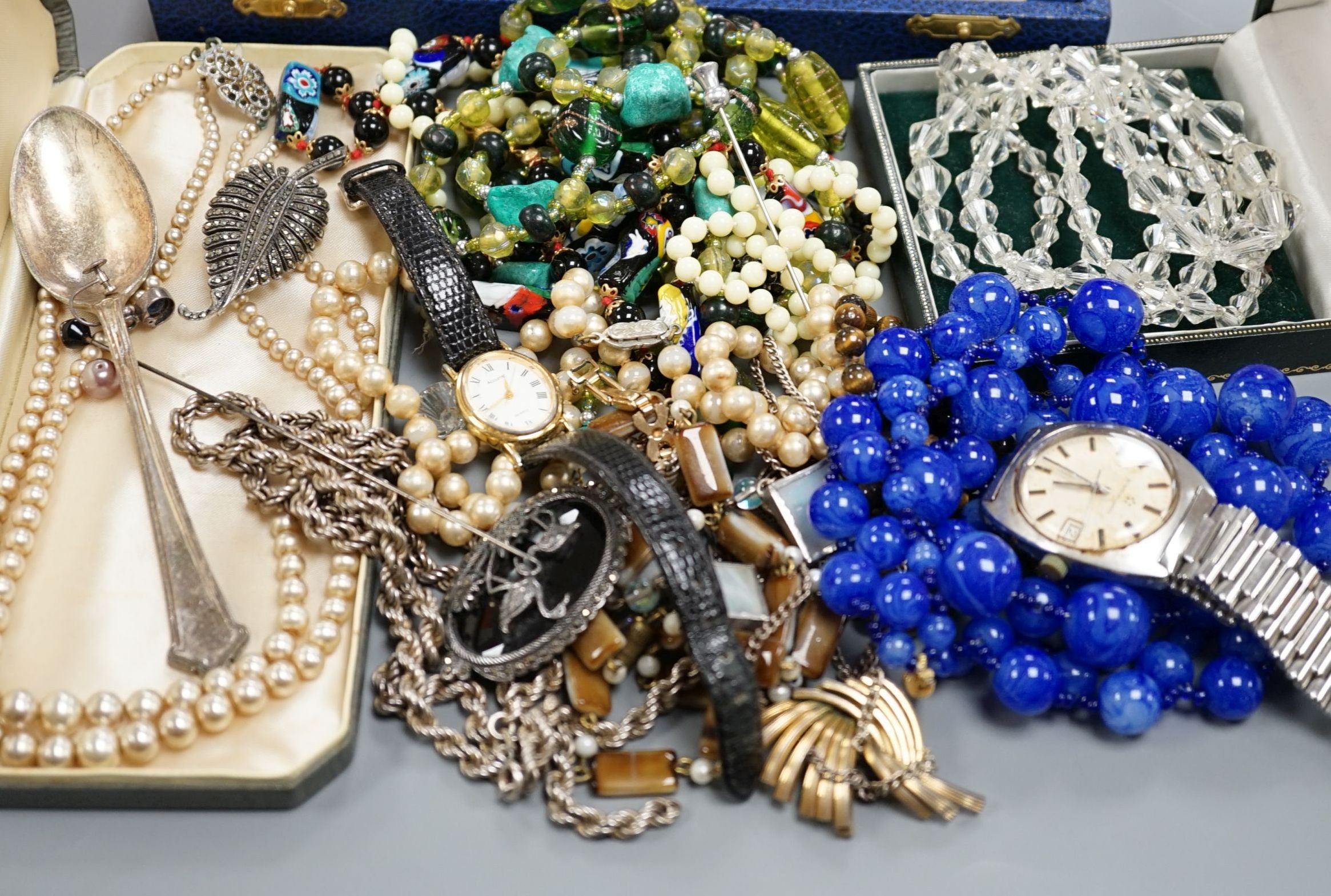 A modern 9ct gold and black onyx spinning fob, a silver ingot pendant, Eternamatic wrist watch, plated flatware and a quantity of assorted costume jewellery.